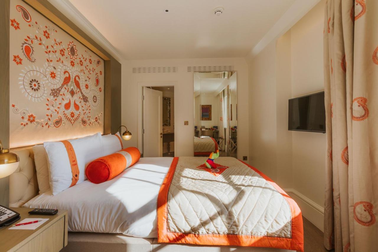 The Lalit London Hotel Exterior foto A bedroom at the Mandarin Oriental, London