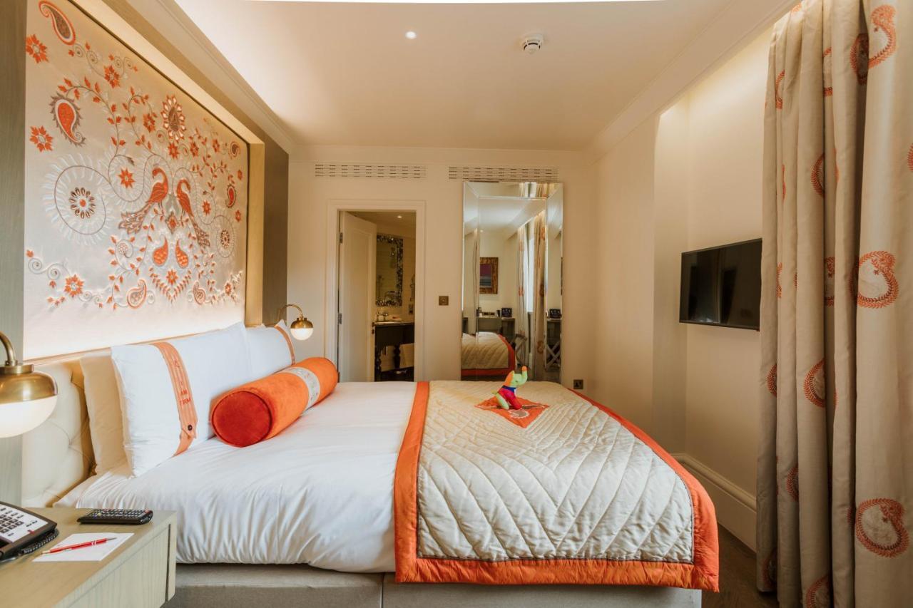 The Lalit London Hotel Exterior foto A bedroom at the Mandarin Oriental London